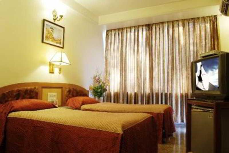 Hotel Mandakini Ambience Pune Quarto foto